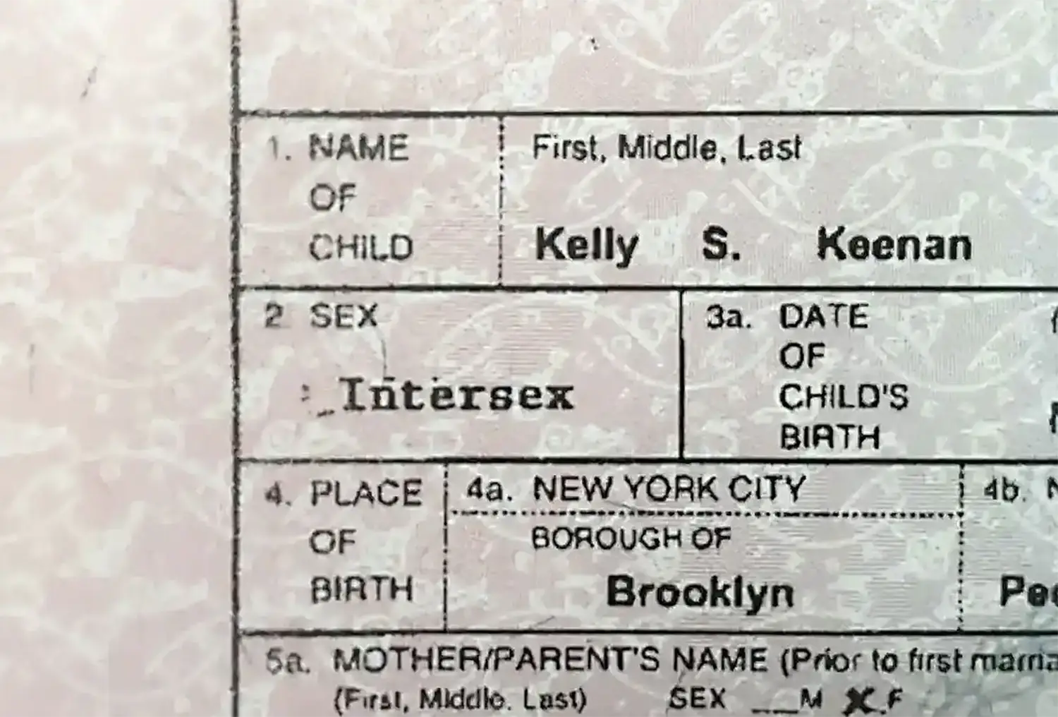 A tight-cropped photo of a birth certificate which has “Intersex” printed beneath the Sex box.