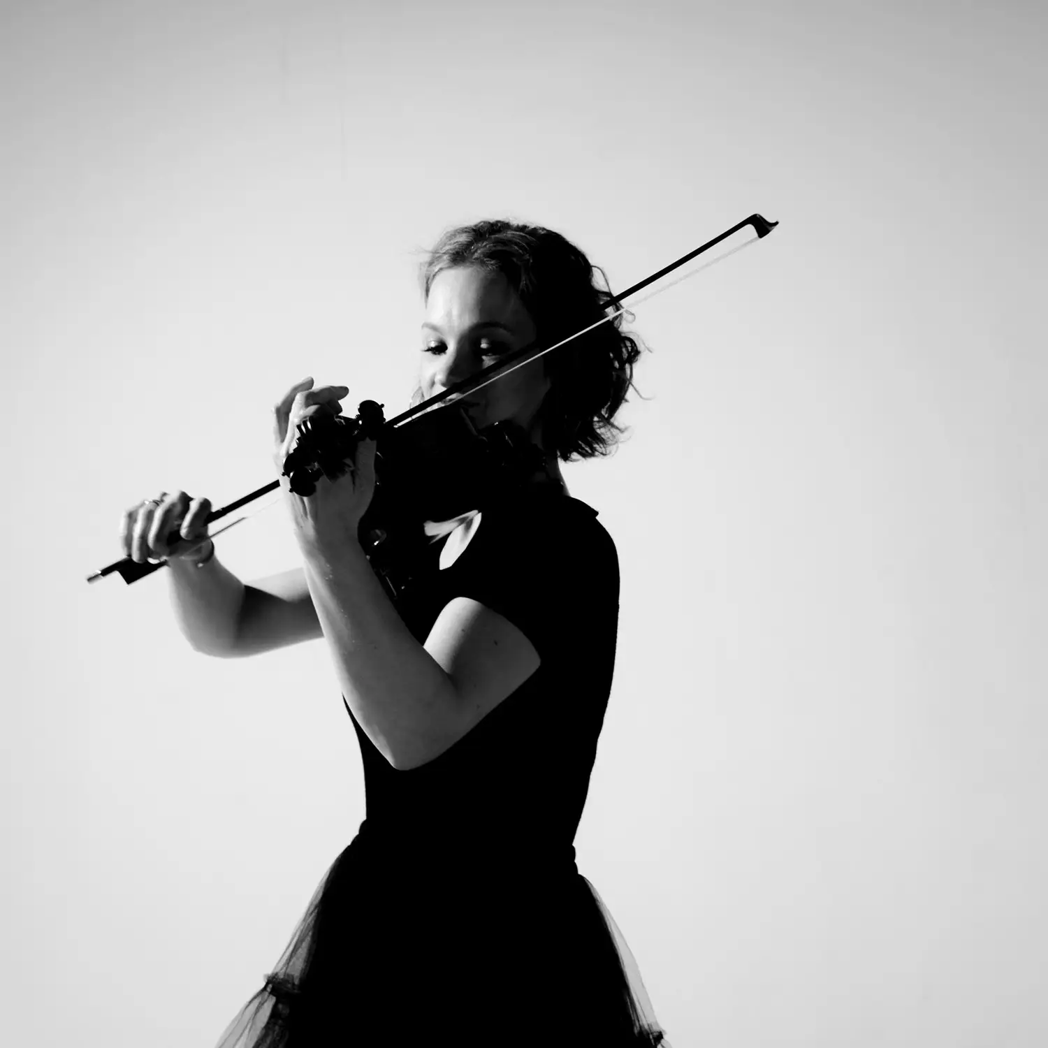 Hilary Hahn playing a violin.